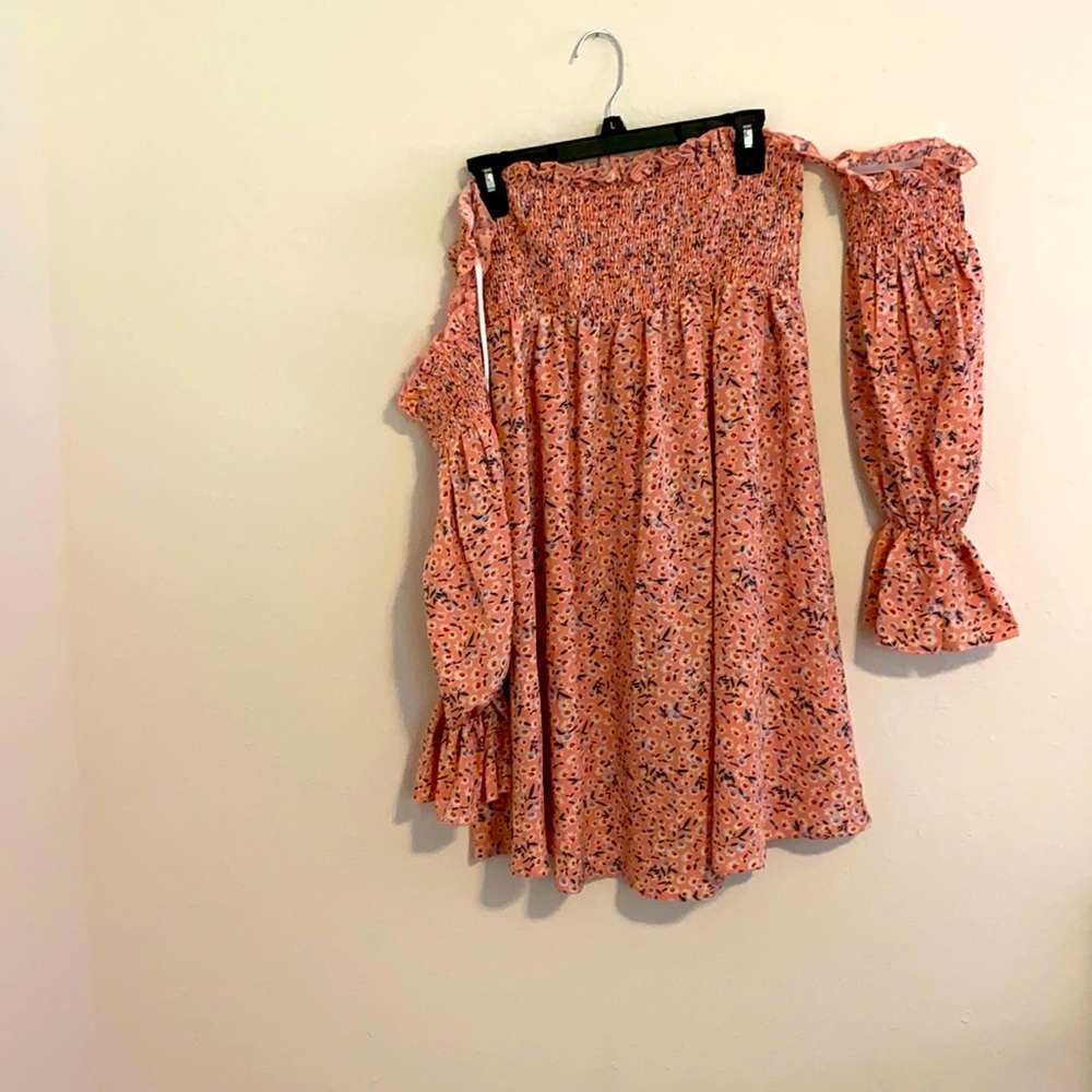 Floral print off the shoulders dress.